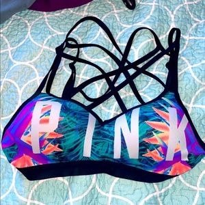 Pink Victoria’s Secret bra. Very detailed back creates a pretty look.